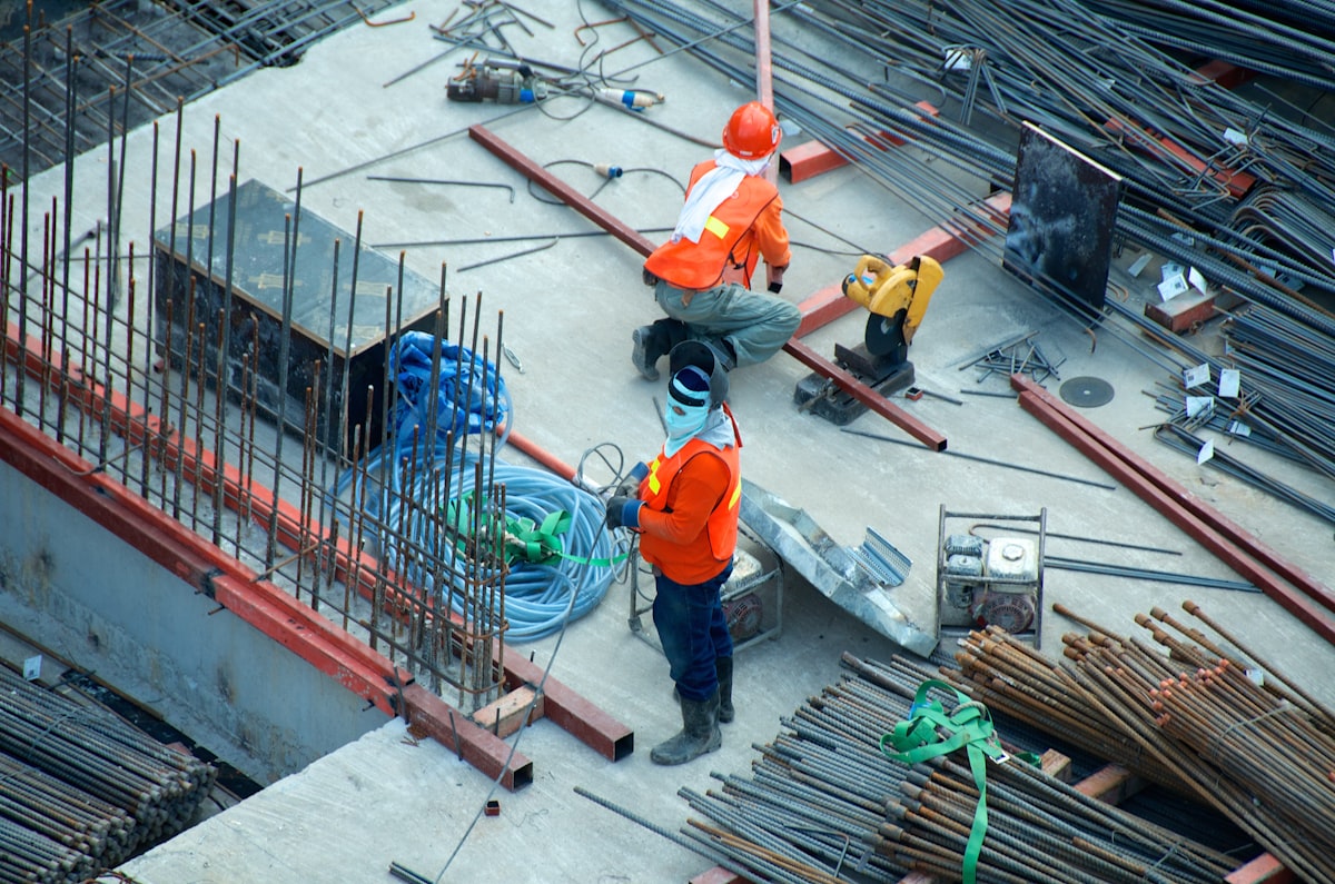 Industrial polyurea spray coating being applied to a concrete surface